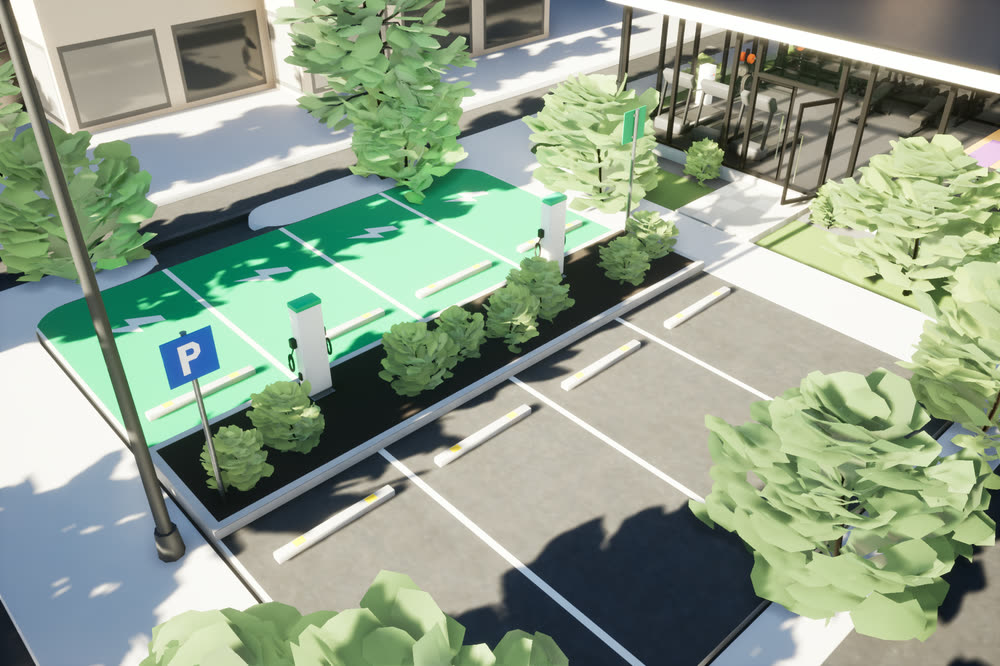 Surface parking with marked bays, trees and a blue parking sign.